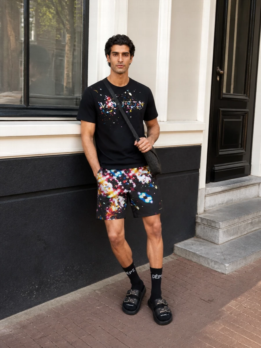 Mcqueen swim shorts black graphic tee outfit