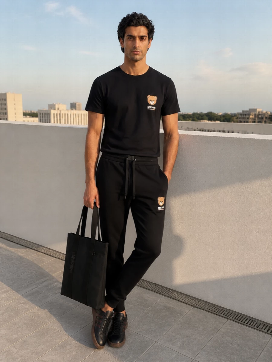 Moschino teddy joggers black adidas sneakers outfit