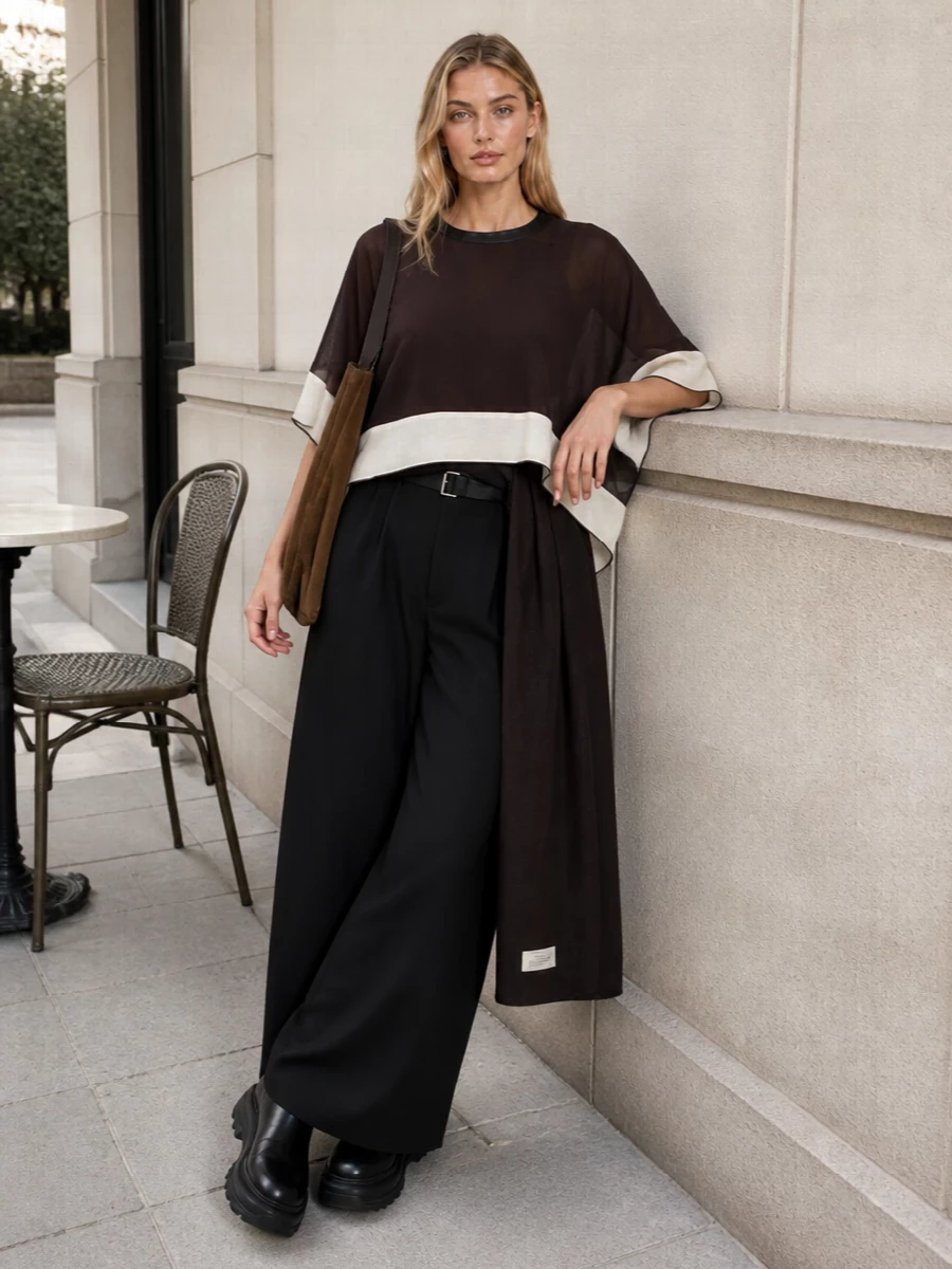 Sacai poncho black wide leg trousers boots