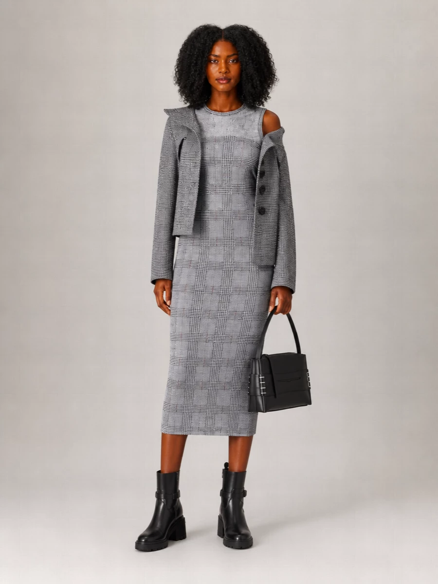 I am anchoring this with the checked Gaultier midi dress rather than a top and bottom, so the Junya coat can sit over one clean, graphic column instead of more tailoring noise. The coat’s subversive neckline, the body-hugging check and the solid, lugged Jimmy Choo boots create a sharp, urban silhouette that is experimental but still ready for a serious dinner or gallery night. The structured black clutch keeps everything disciplined and modern, quietly framing the plaids and asymmetric details rather than fighting them.