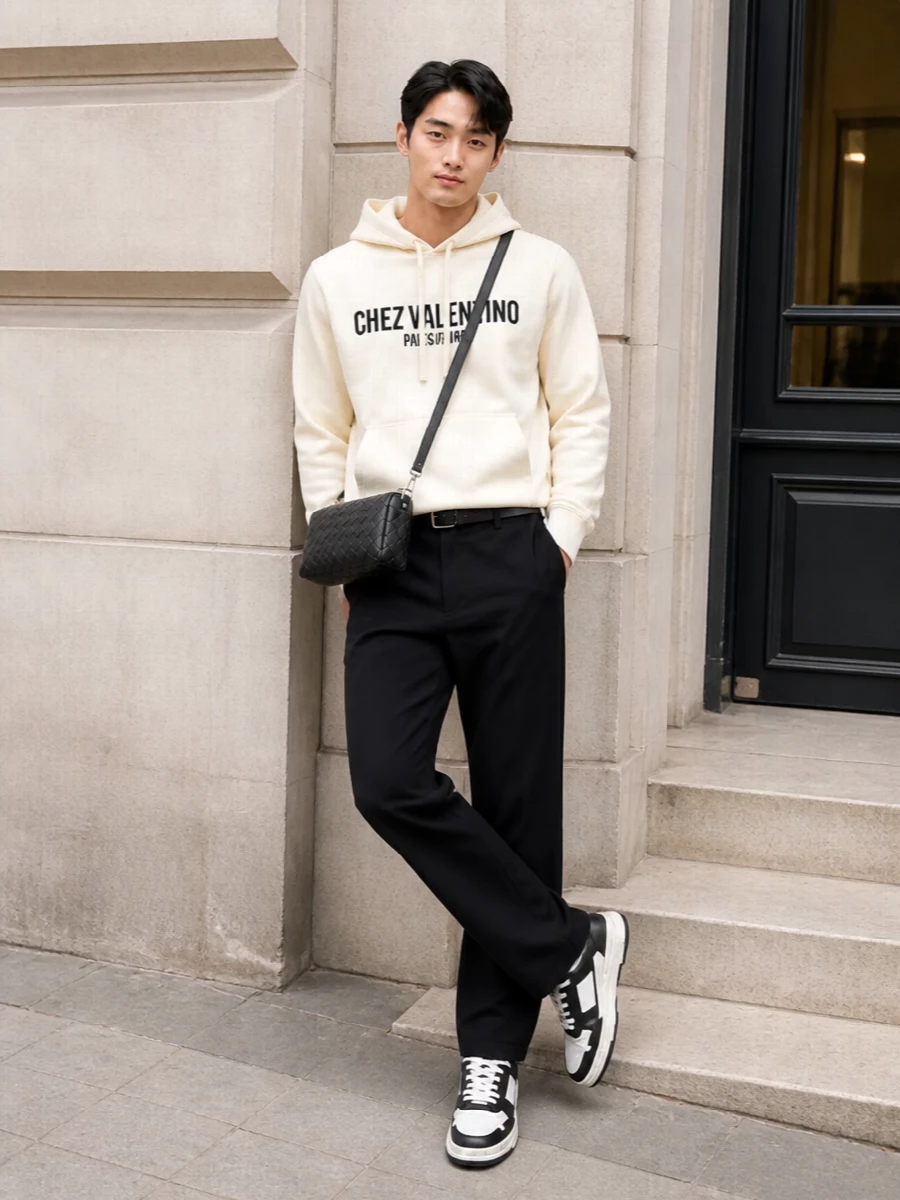 Valentino cream hoodie black trousers outfit