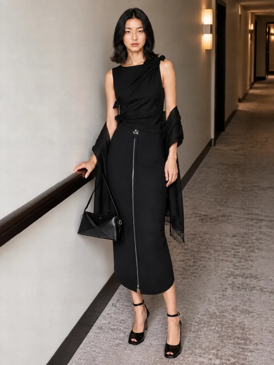 Coperni black asymmetric top midi skirt outfit