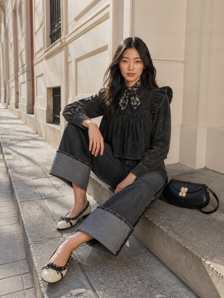 Ganni ruffled black blouse wide leg denim flats