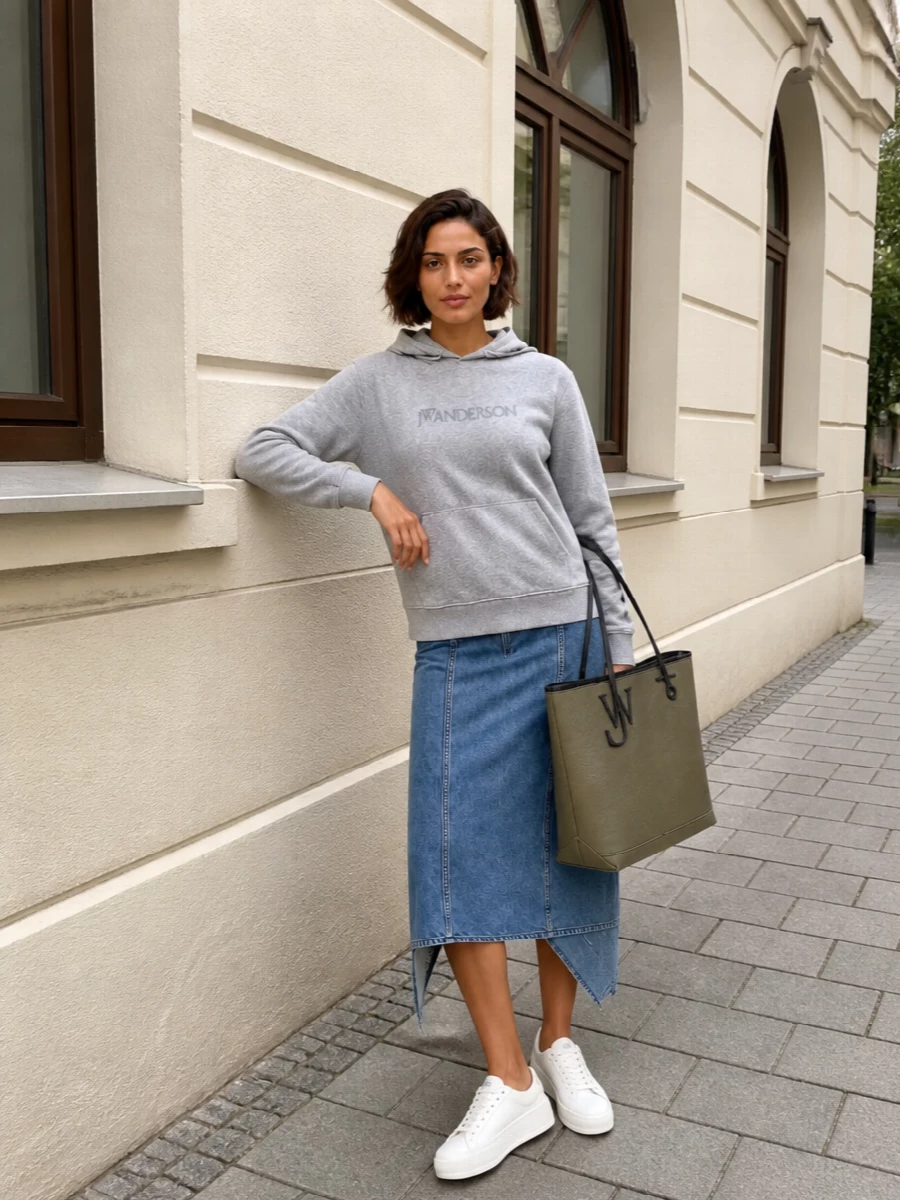 Jw anderson hoodie denim skirt sneakers outfit