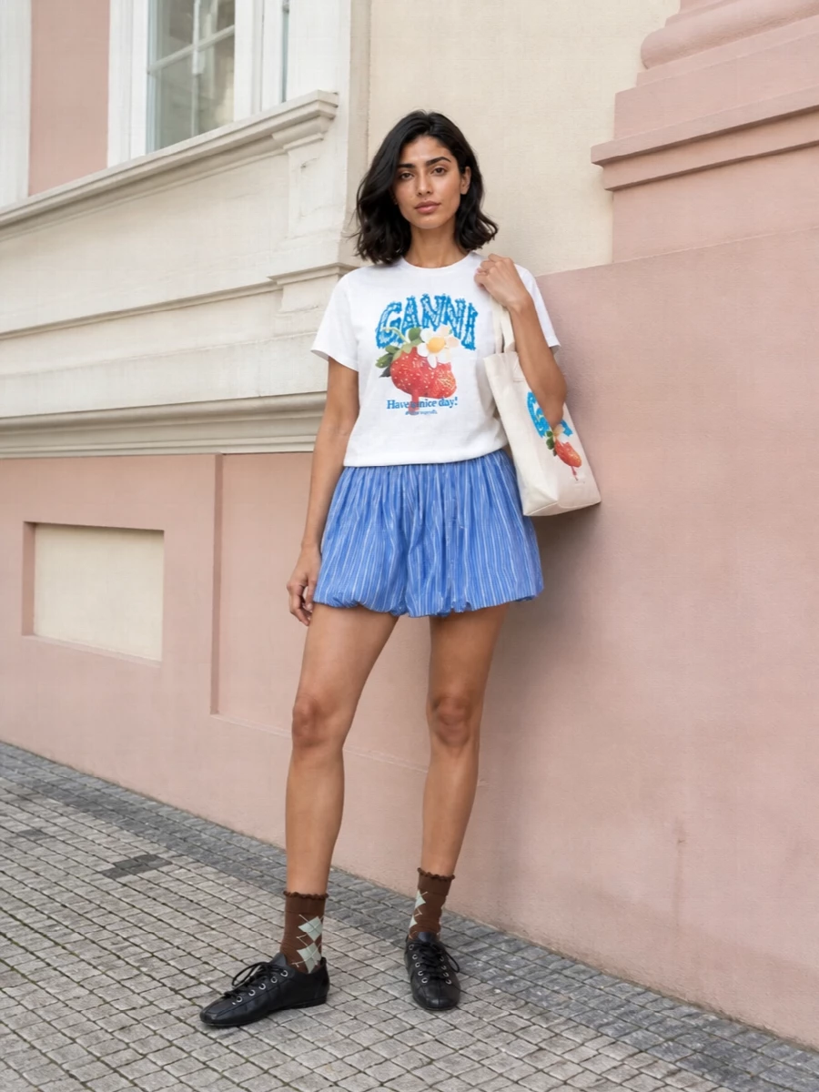 Ganni graphic tee striped mini skirt outfit