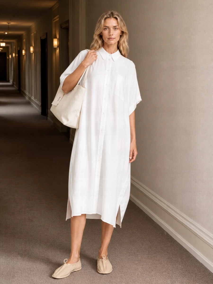 A soft white Mm6 cocoon shirt dress with the ecru A.P.C. tote and butter-beige flats creates a tonal, city-ready uniform that feels relaxed but intentional. The volume of the dress is balanced by the neat, ruched ballerina profile so the silhouette stays clean rather than oversized. Choosing the dress path keeps the story very minimal and tonal, letting the tote read as part of a quiet, all-neutral summer palette instead of competing with denim or darker separates.